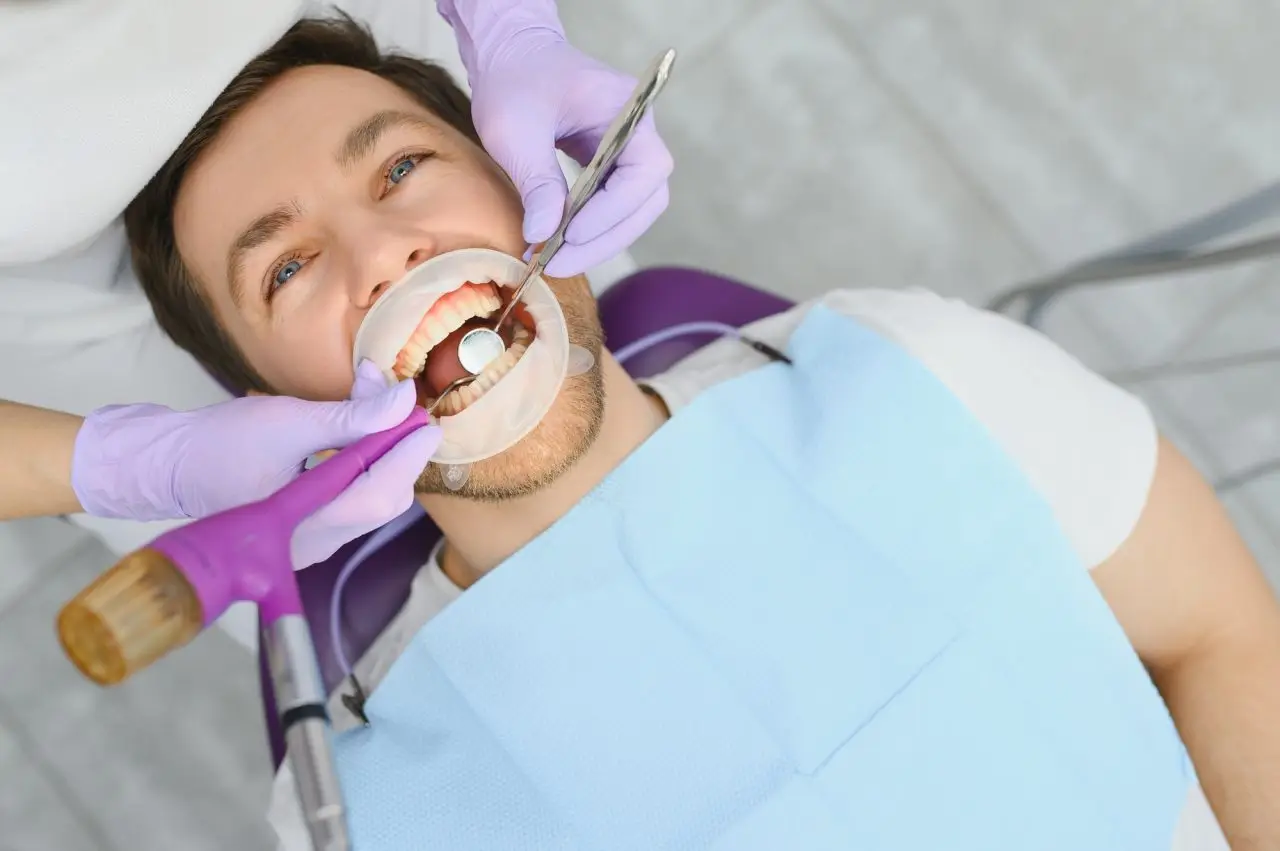 Patient receiving periodontal gum care at Signature Smiles Dental Group in Milpitas, CA