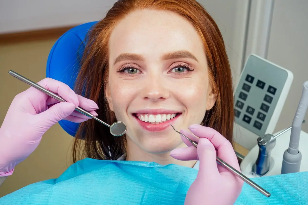 Patient smiling confidently after cosmetic dental treatment at a Milpitas dental practice
