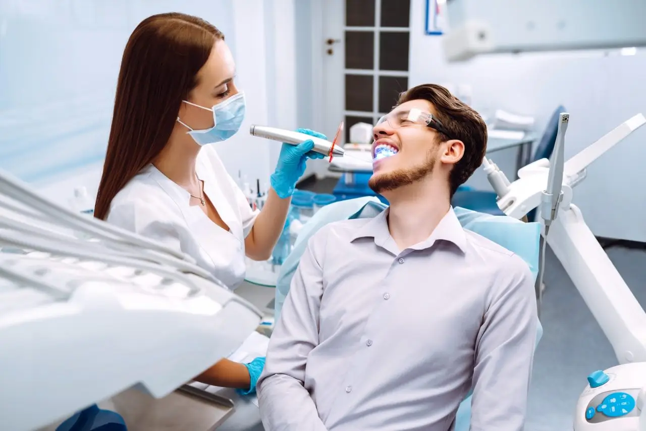 Dentist applying dental sealants for cavity prevention in Milpitas, CA
