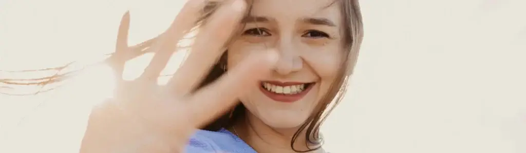 Cosmetic dentistry Milpitas - patient smiling after smile makeover at Signature Smiles Dental Group